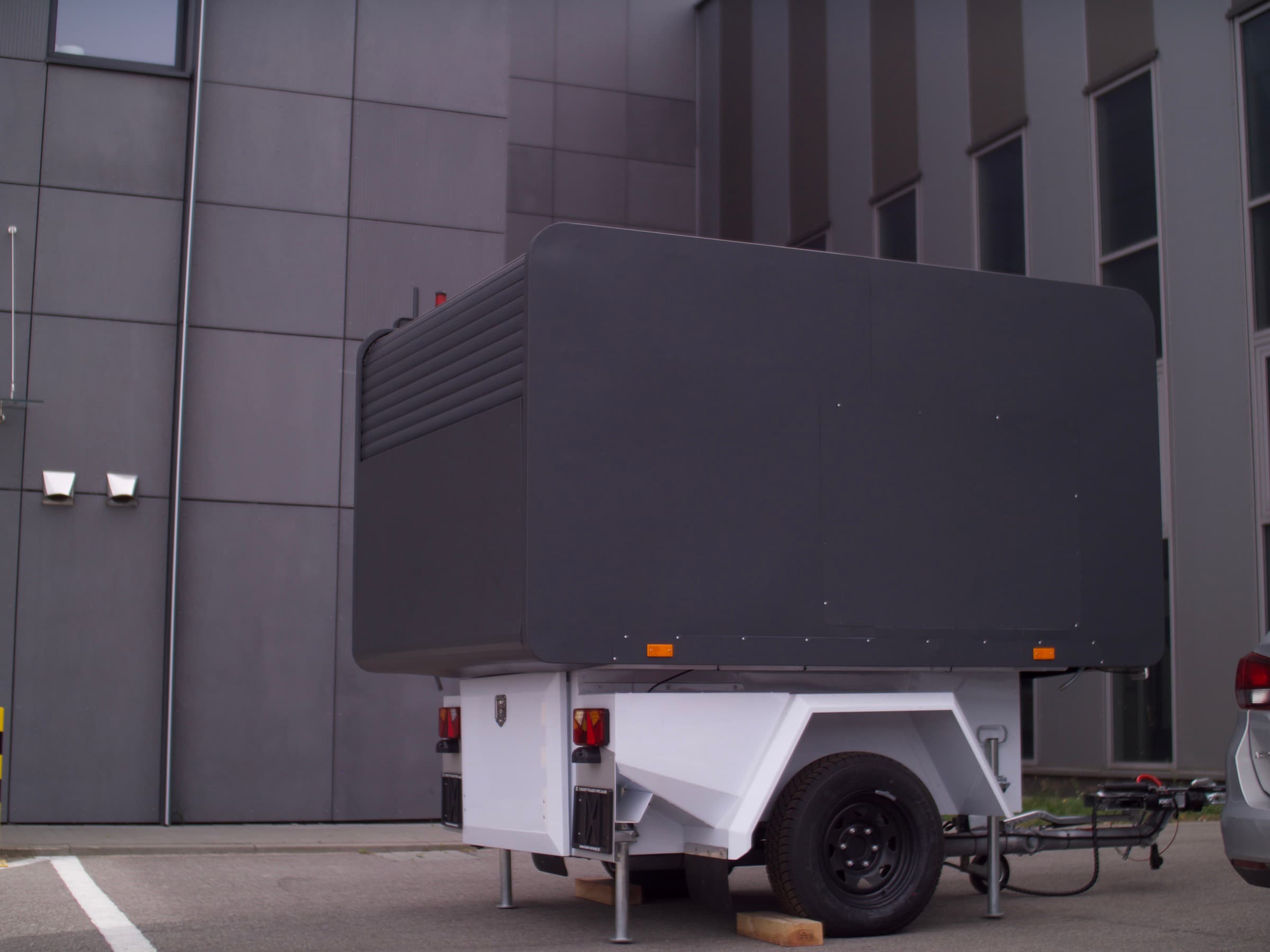 Dronehub mobile drone-in-a-box deployed for autonomous docking and battery swap in the field.